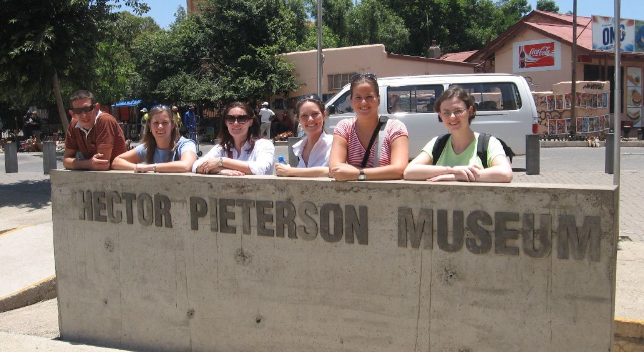 Picture of tourists in front of Hector Pieterson Museum
